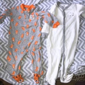 3 Carter’s footed jammies. Size 9 months